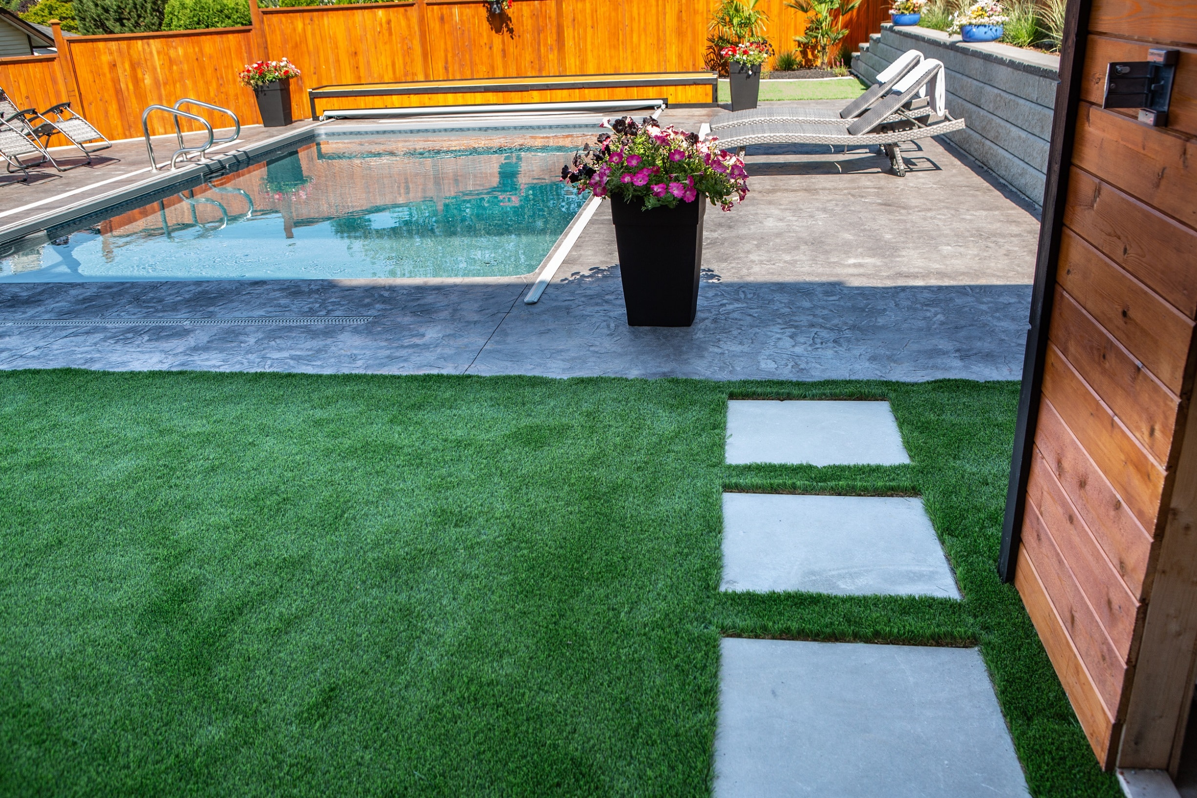 artificial grass with cutout stone walkway